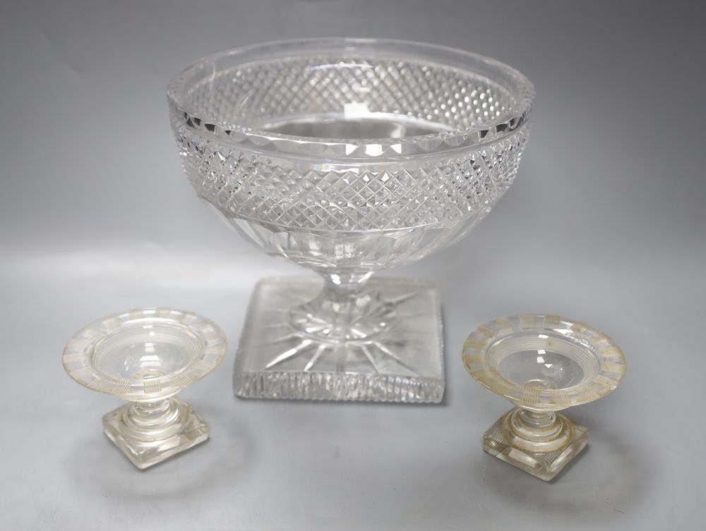 A deeply cut glass pedestal bowl, diameter 20cm and a pair of miniature glass comports, diameter 9cm